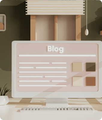 A desktop monitor displaying a blog layout on a warm-toned desk.